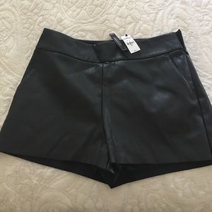 Black faux leather shorts