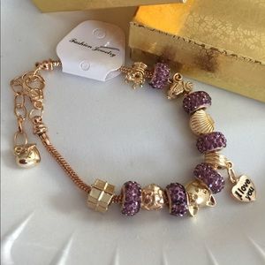 Gold purple charms beautiful 7.5" bracelet new