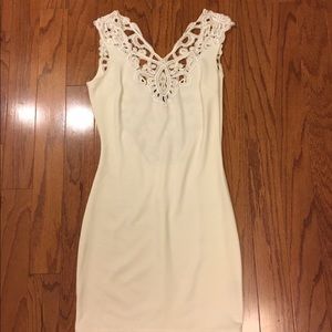 White Lacey dress with beautiful embellishment.