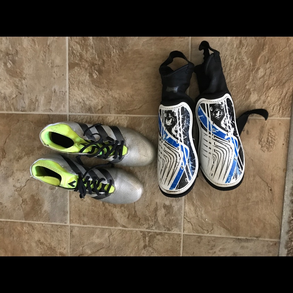 Adidas cleats and shin guards