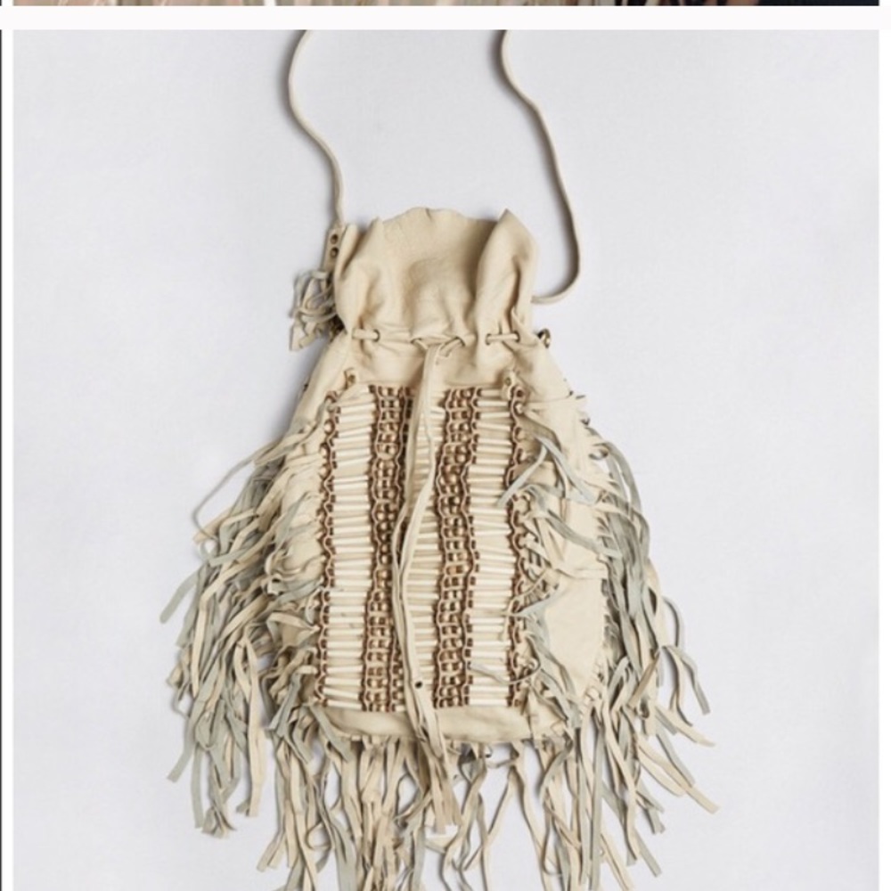 ISO spell designs bone and tassel leather handbag