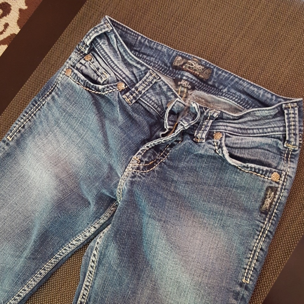 Silver jeans.