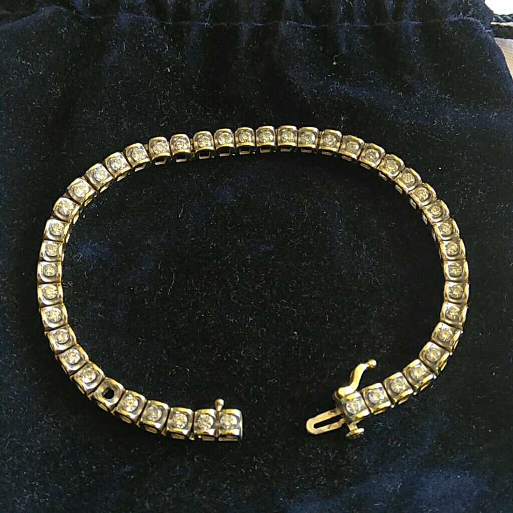 Beautiful gold diamond bracelet, appraised at 5k.