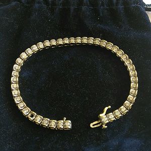 Beautiful gold diamond bracelet, appraised at 5k.