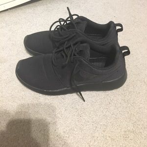 Black on black Nike Roshes