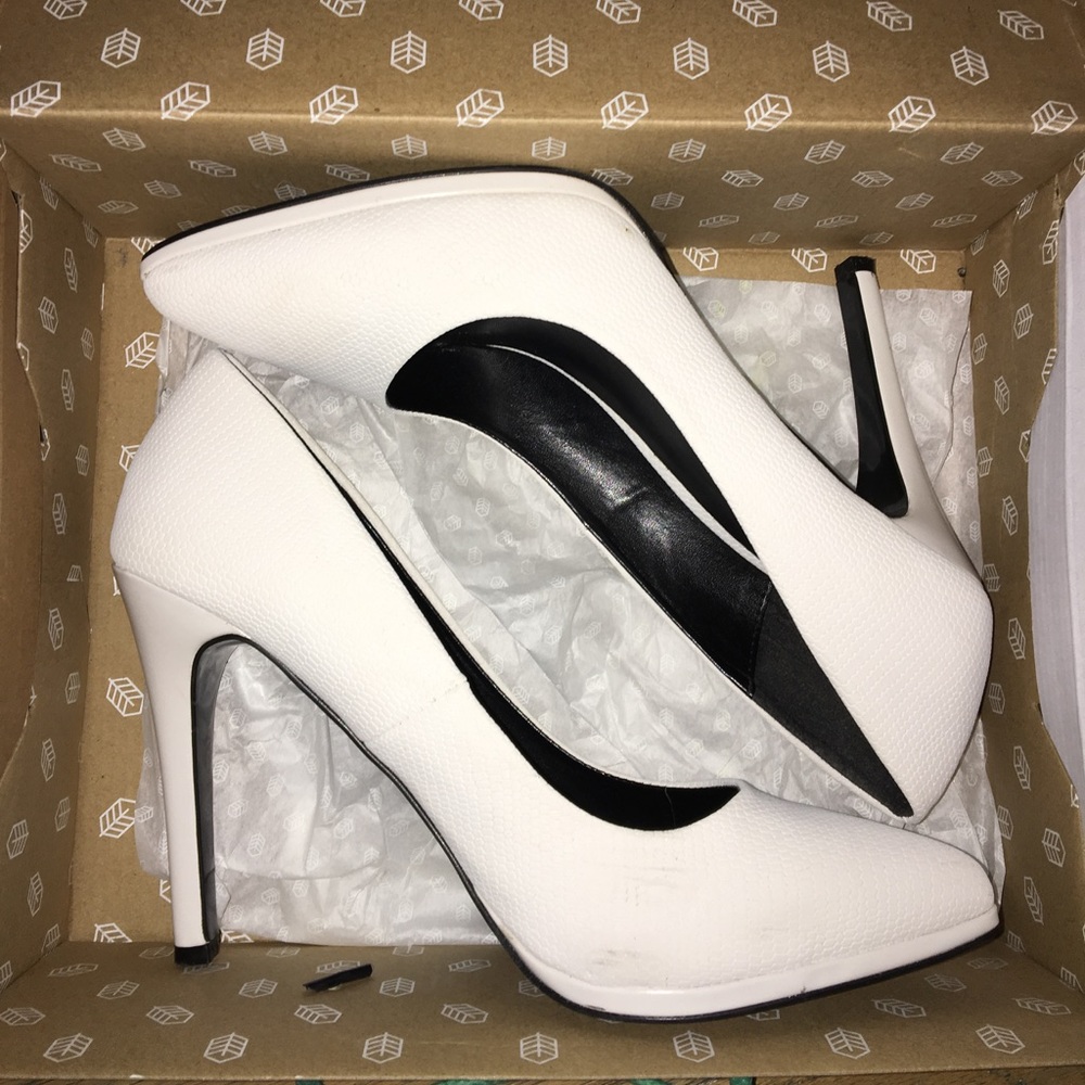 White pointed toes high heels