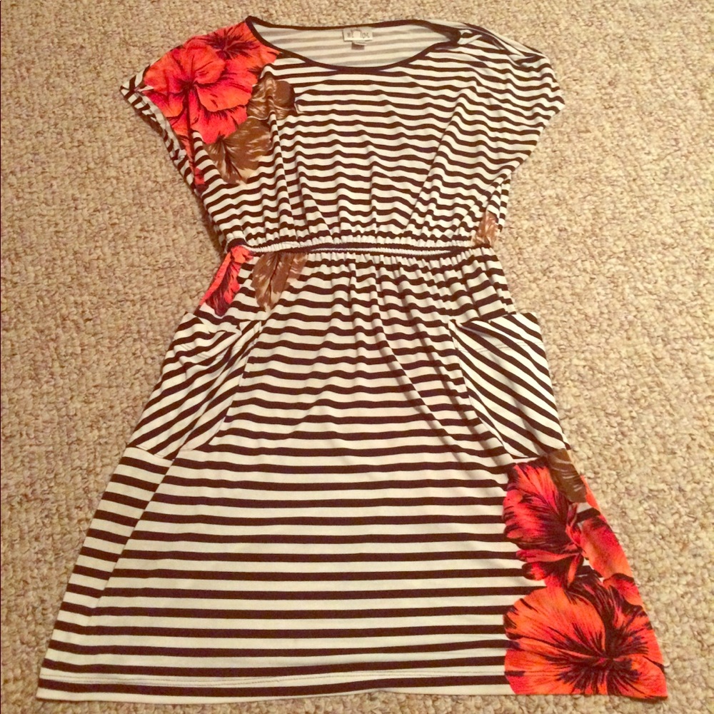 Black and white dress with pockets and red flowers