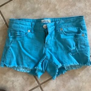 Neon blue distressed shorts from Aeropostale