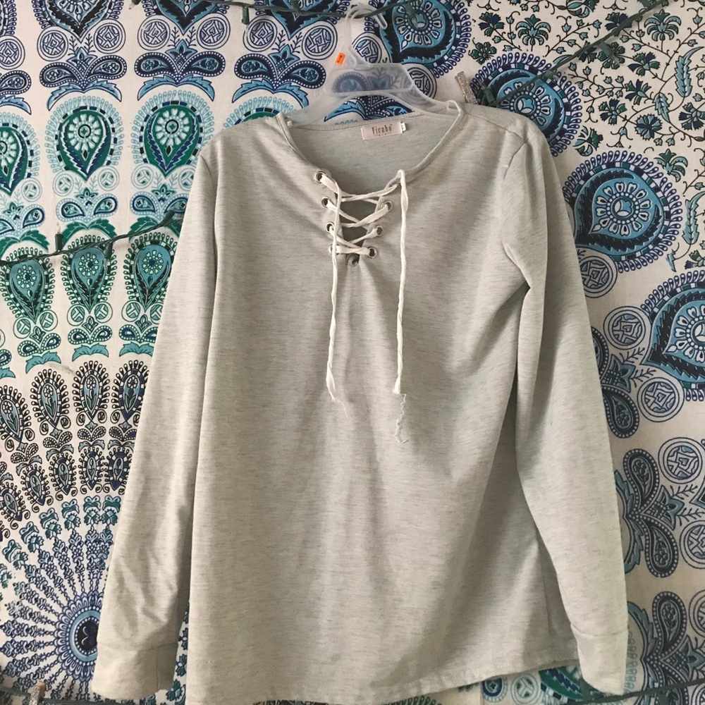 Criss cross tie jacket