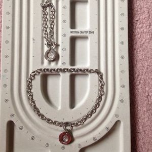 Matching silver Guess necklace and bracelet