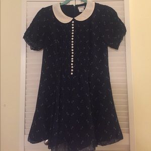 Navy romper with scalloped collar