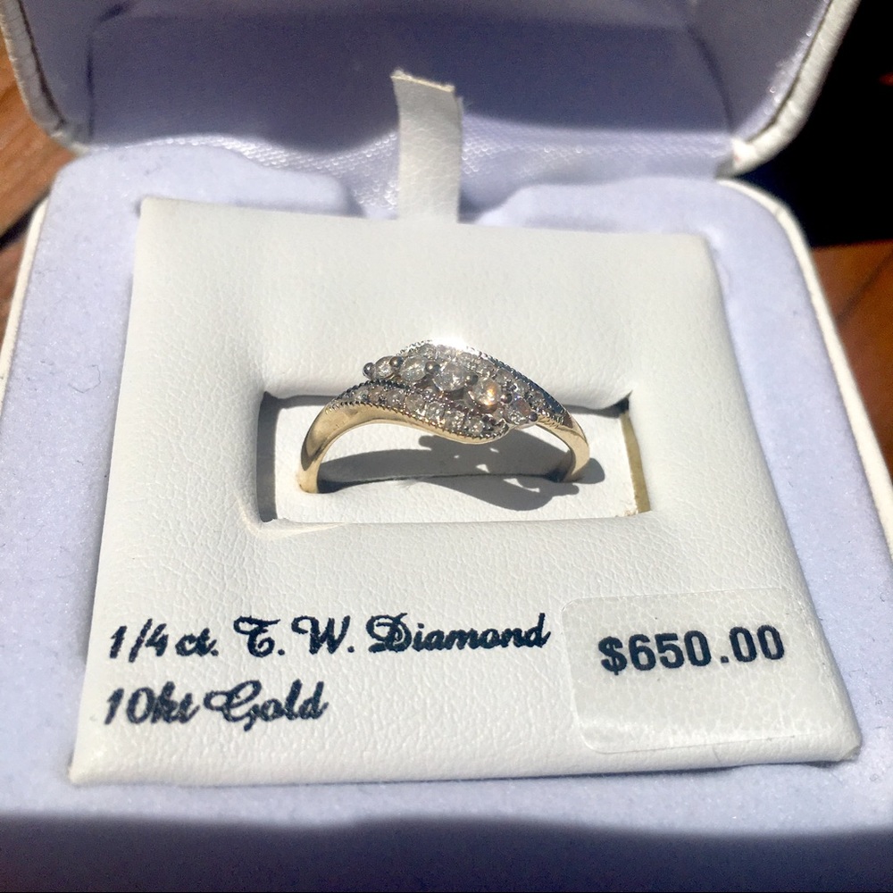 1/4 Ct. T.W. Diamond W/ 10kt. Gold Ring