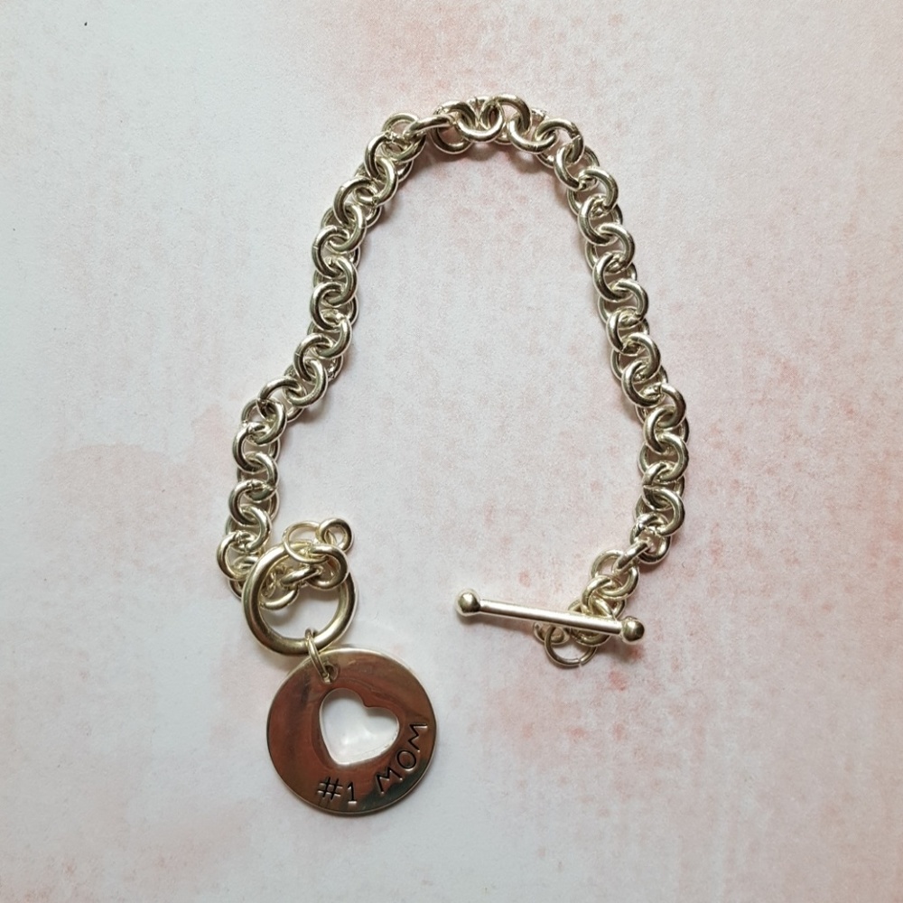 Silver look fashion charm bracelet