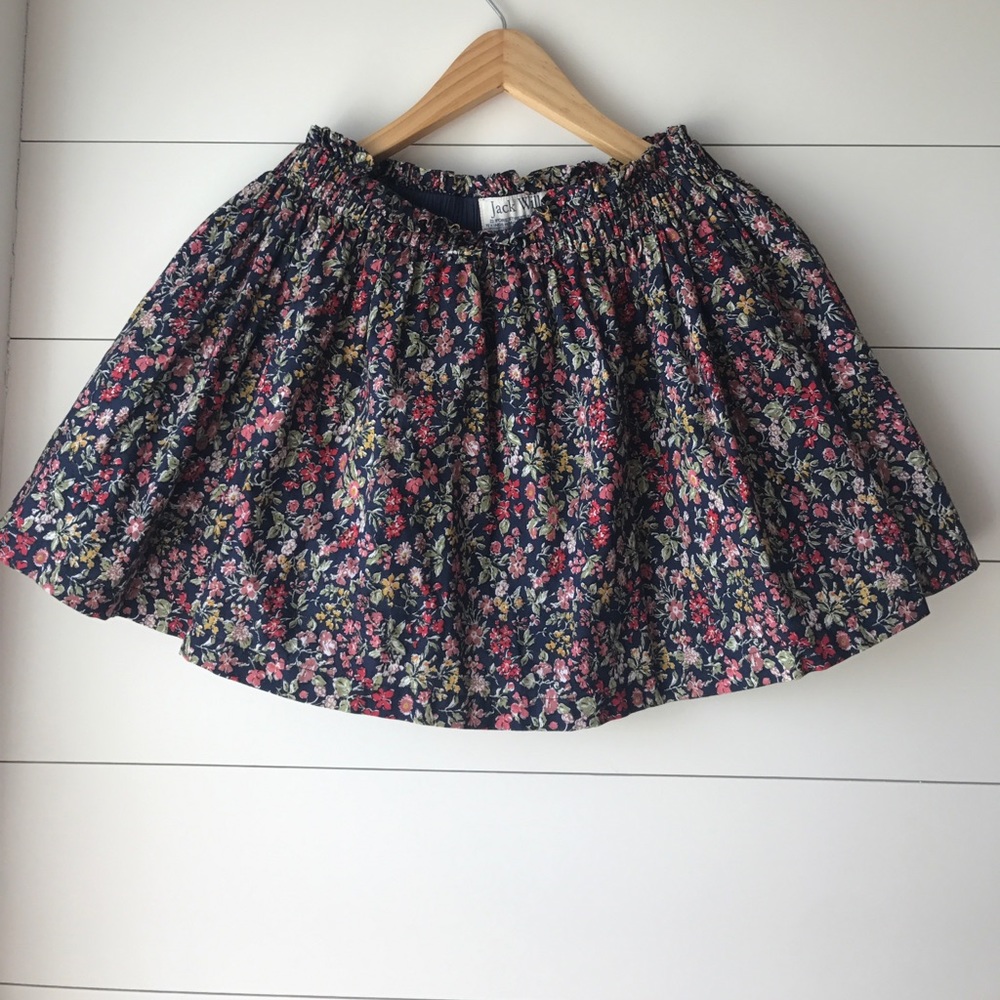 Floral skirt with a navy blue background.