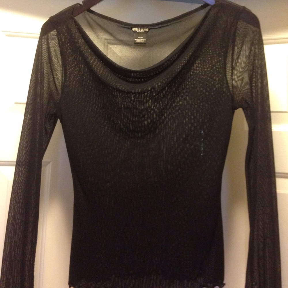 Top in transparent fabric