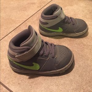 Boys leather mid top Nike shoes