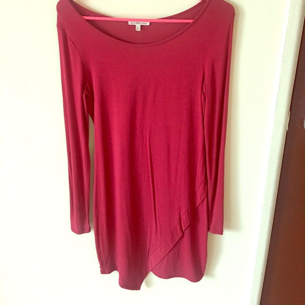 Long sleeve dress with side slit.