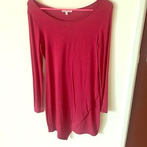 Long sleeve dress with side slit.