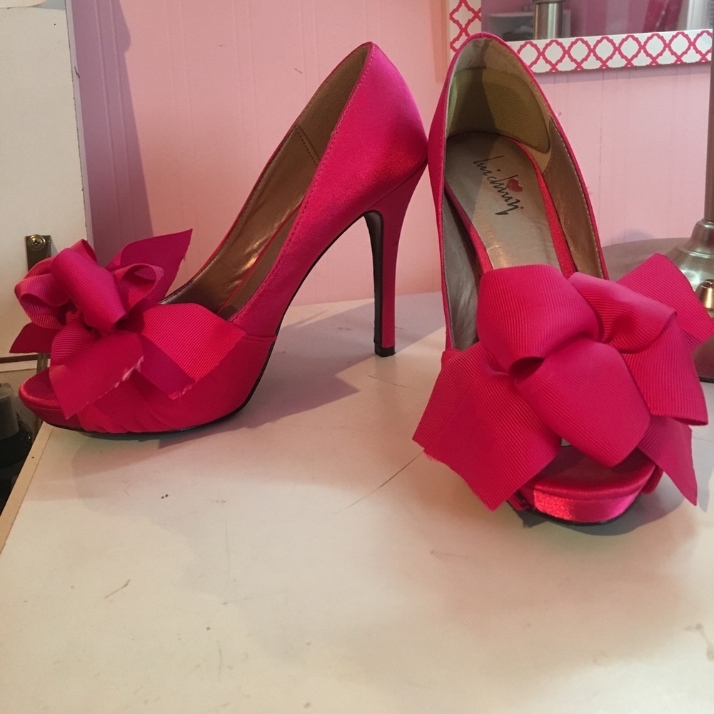 Open toe hot pink heels
