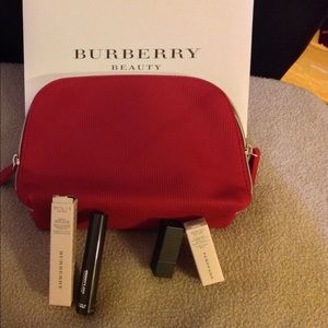 Burberry clutch with mascara and lipstick❗️