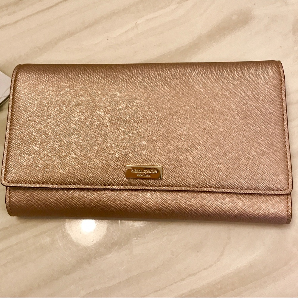 Kate Spade Newbury Lane Travel Wallet in Rose Gold