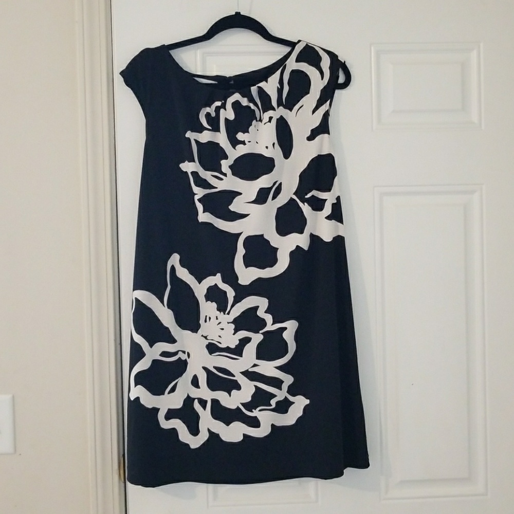 Super cute LBD with fun white floral pattern.