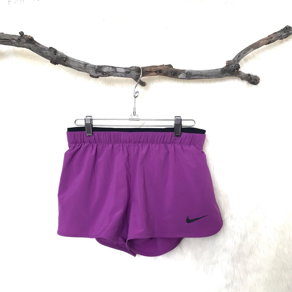 Nike Dri-fit exercise shorts. Purple, size small.