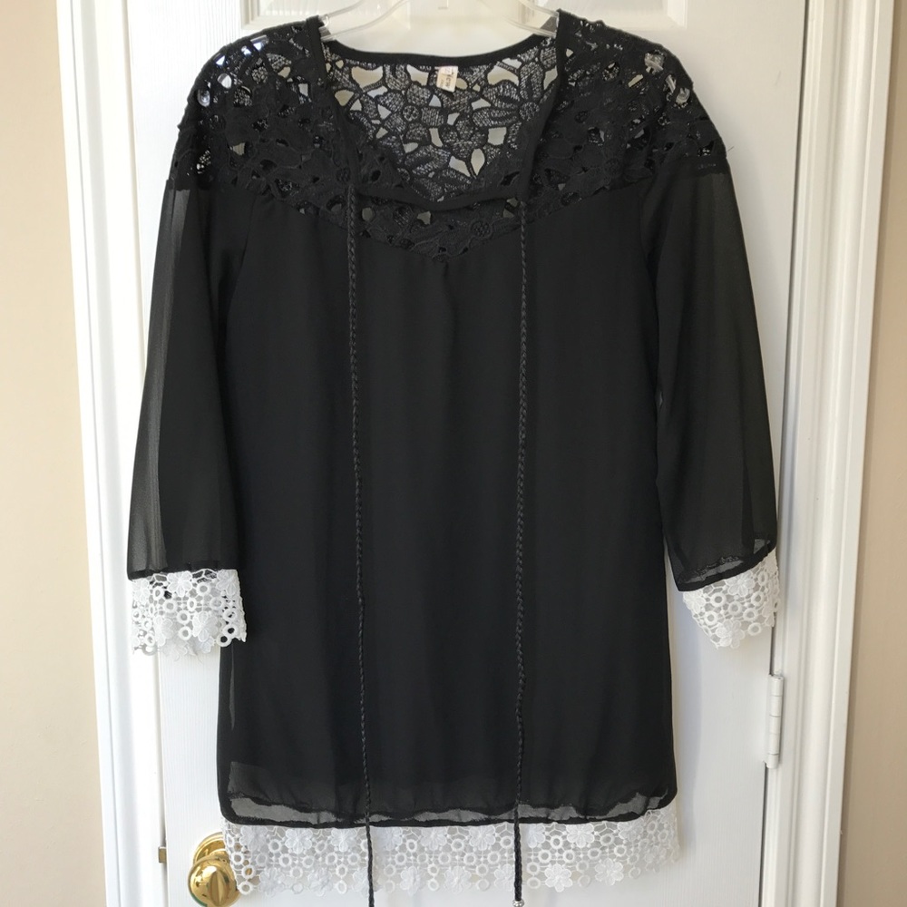 Sheer black top with white lace