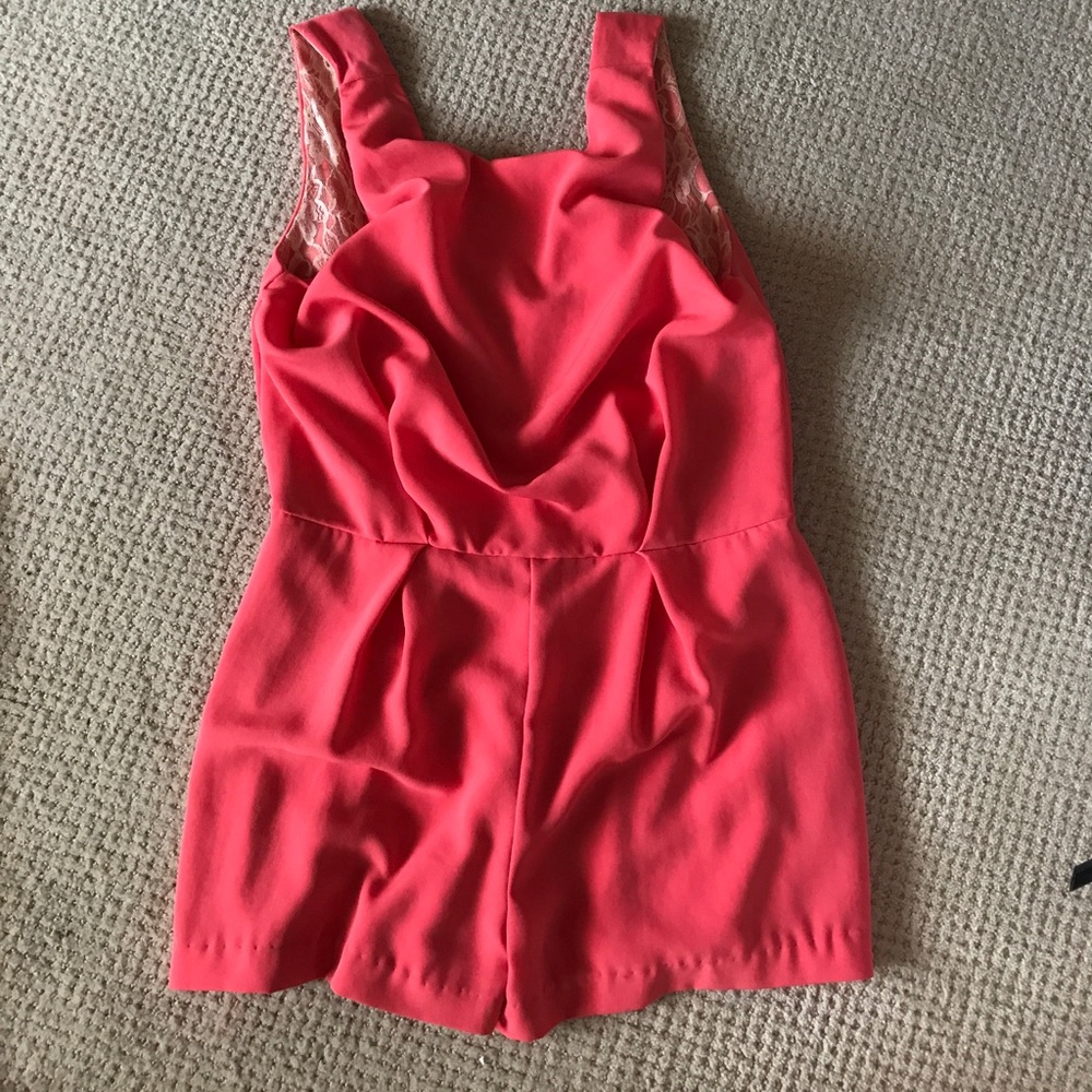 coral dressy romper with lace back