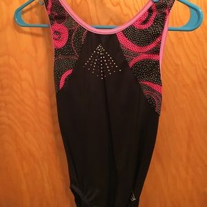 black and pink gymnastics leotard