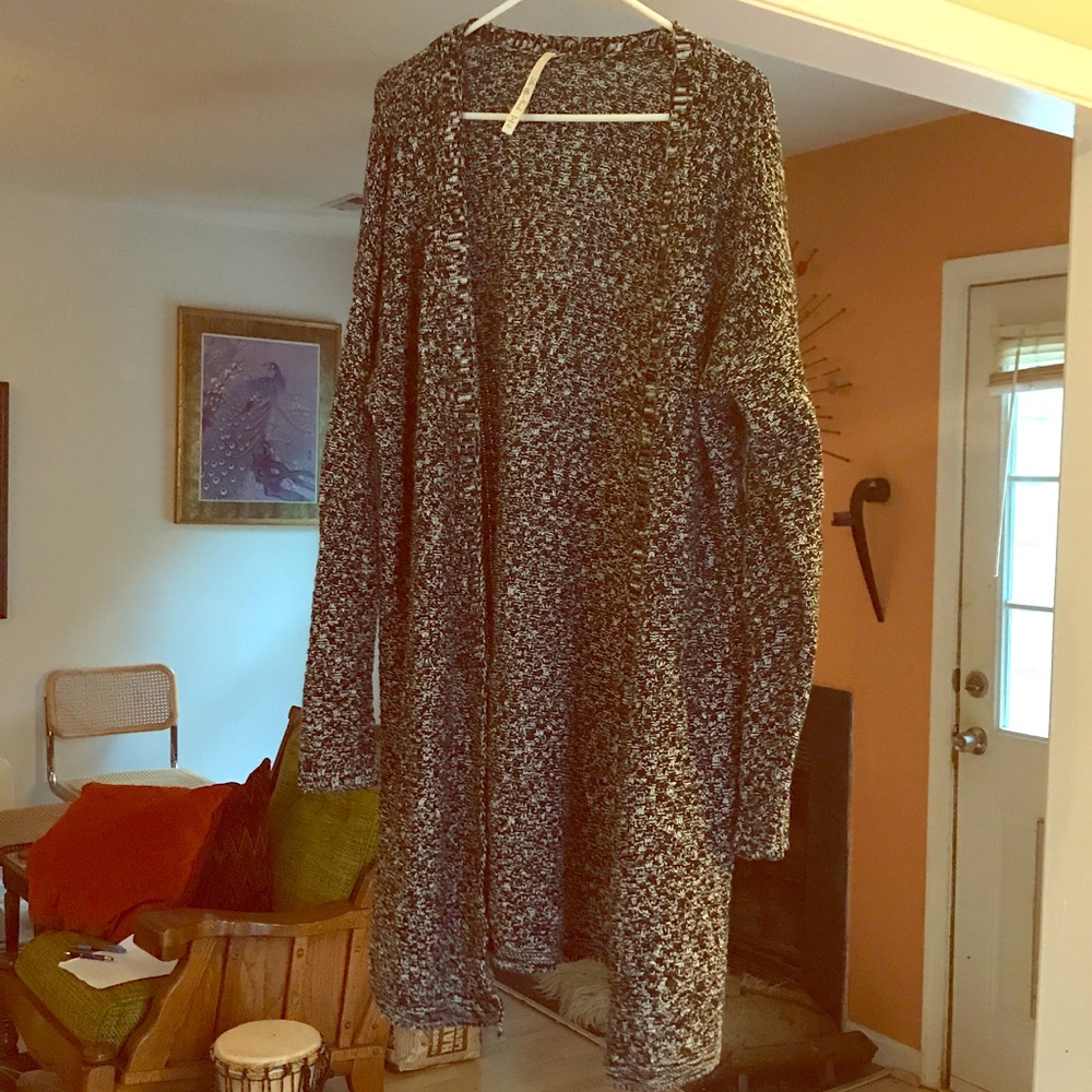 Leo & Nicole- knee length cardigan.
