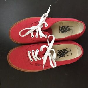 Red and brown low top vans