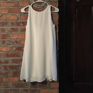 White dress with bow accent