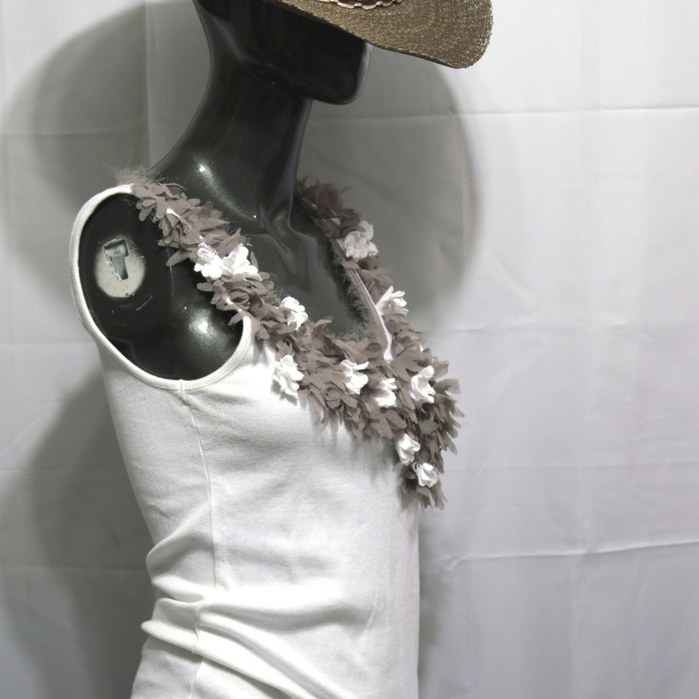 Tank top white with fluff around neck