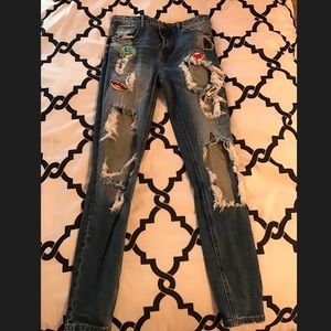 Ripped skinny jeans with patches