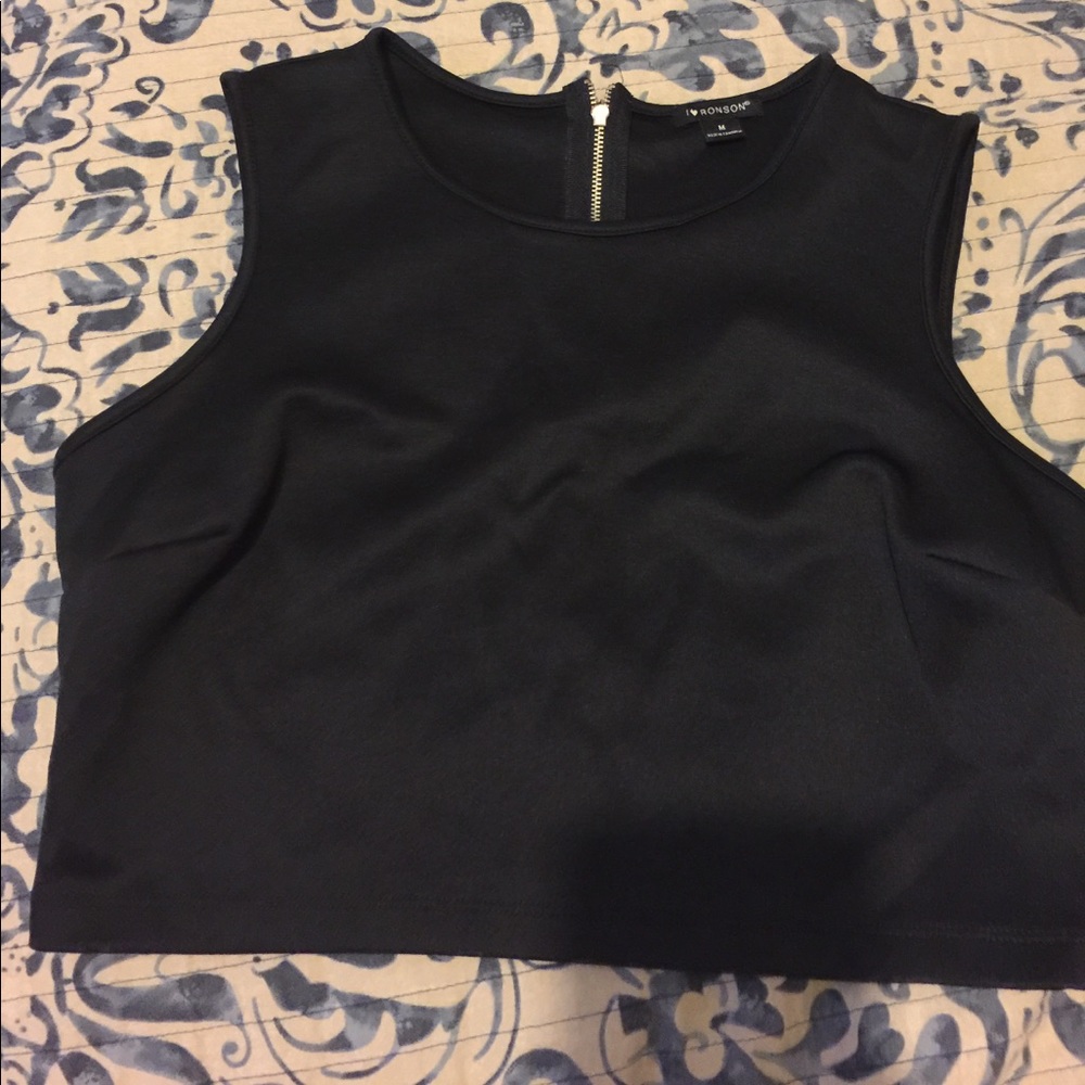 Black crop top that tips in the rear