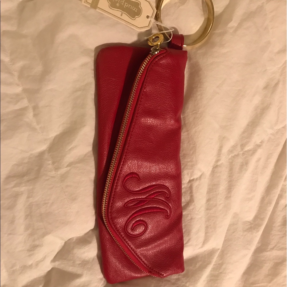 Brand new Mud pie clutch with M initial