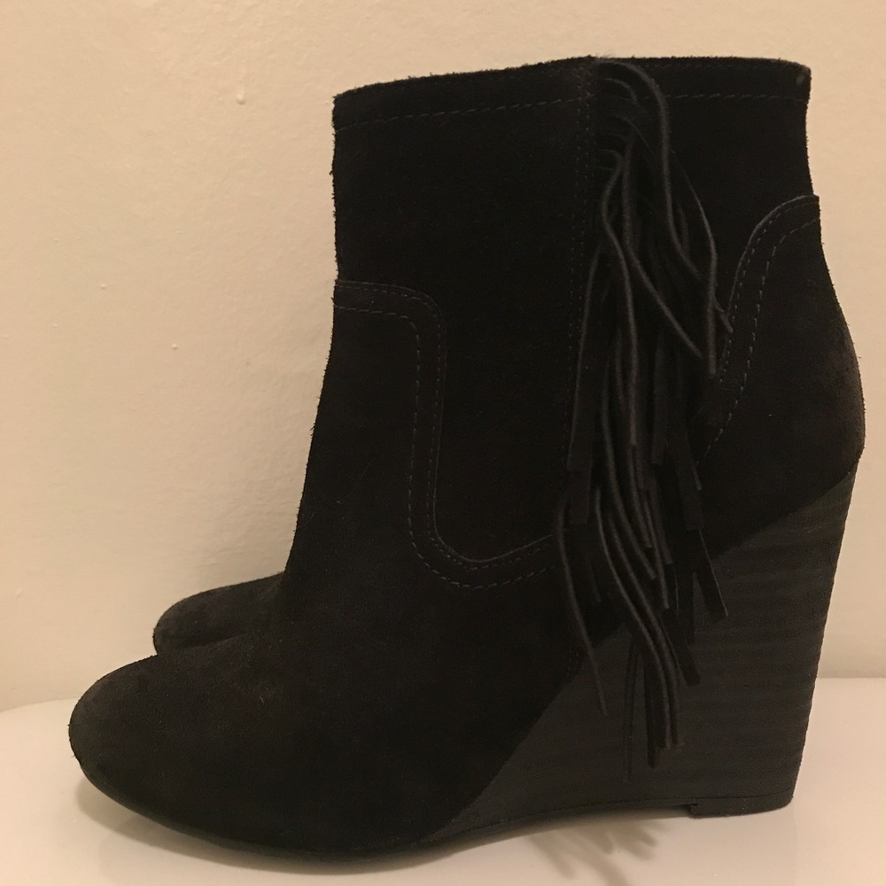 Black fringe wedge booties