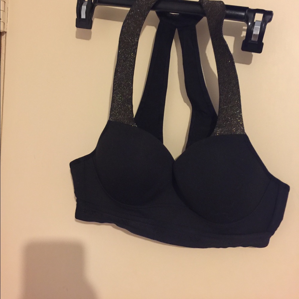 VS black with gold trim sports bra