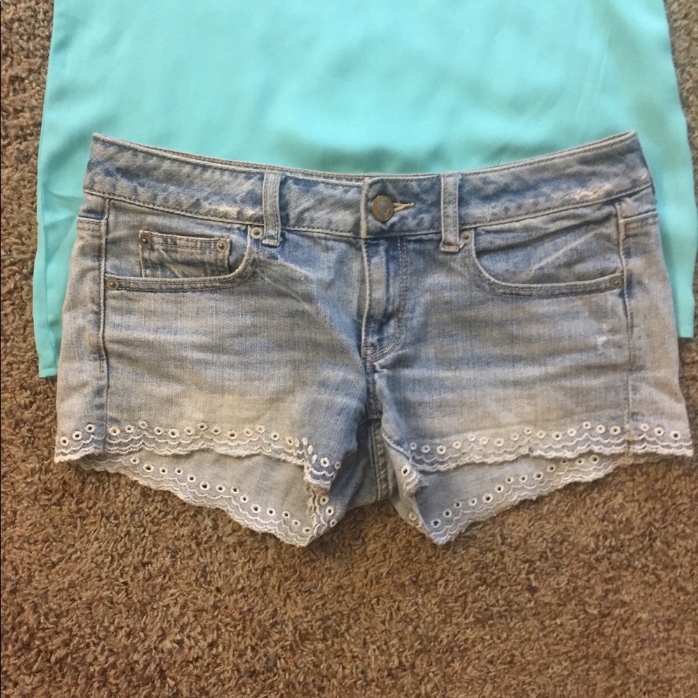 Jean shorts with eyelet detailing