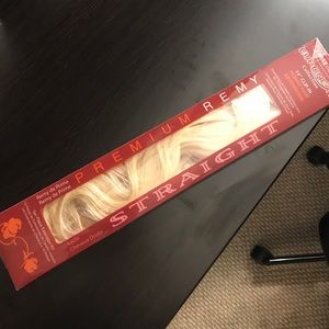 Blonde hair extensions