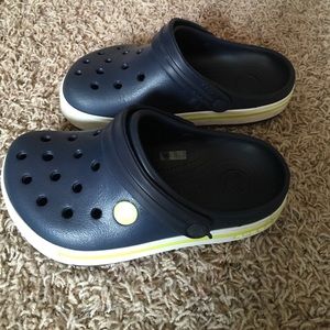 Blue kids Crocs clogs.