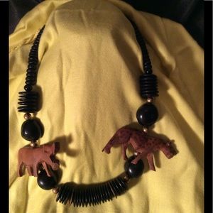 Tiger and Hippo wooden carved necklace