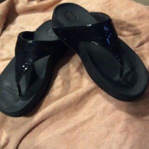 Black sequined Fit Flops.