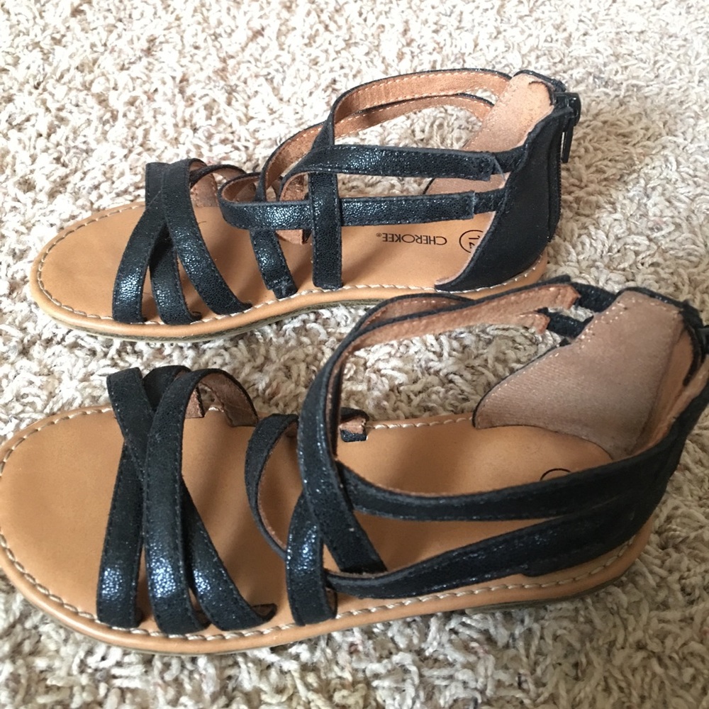 Girls black gladiator sandles.