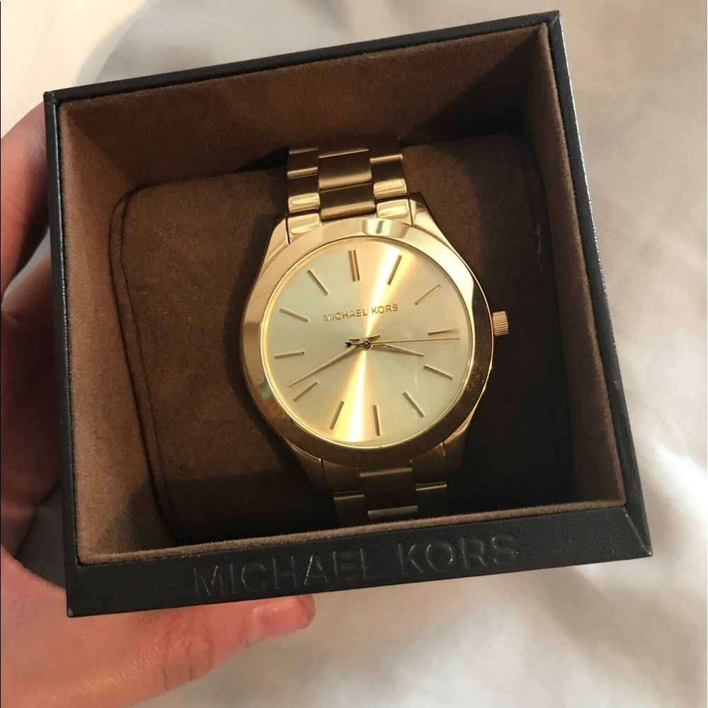 Men's brand new Michael Kors gold watch