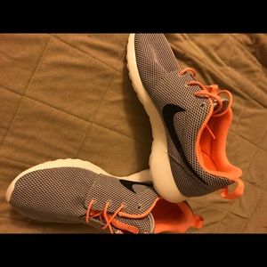Orange and Gray Nike shoes