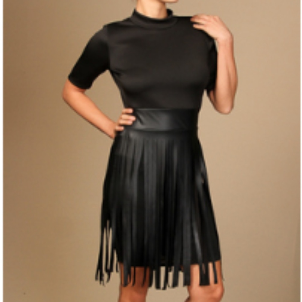 Mock neck dress with faux leather fringe skirt.