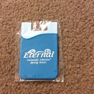 Stick on the back of the phone card holder