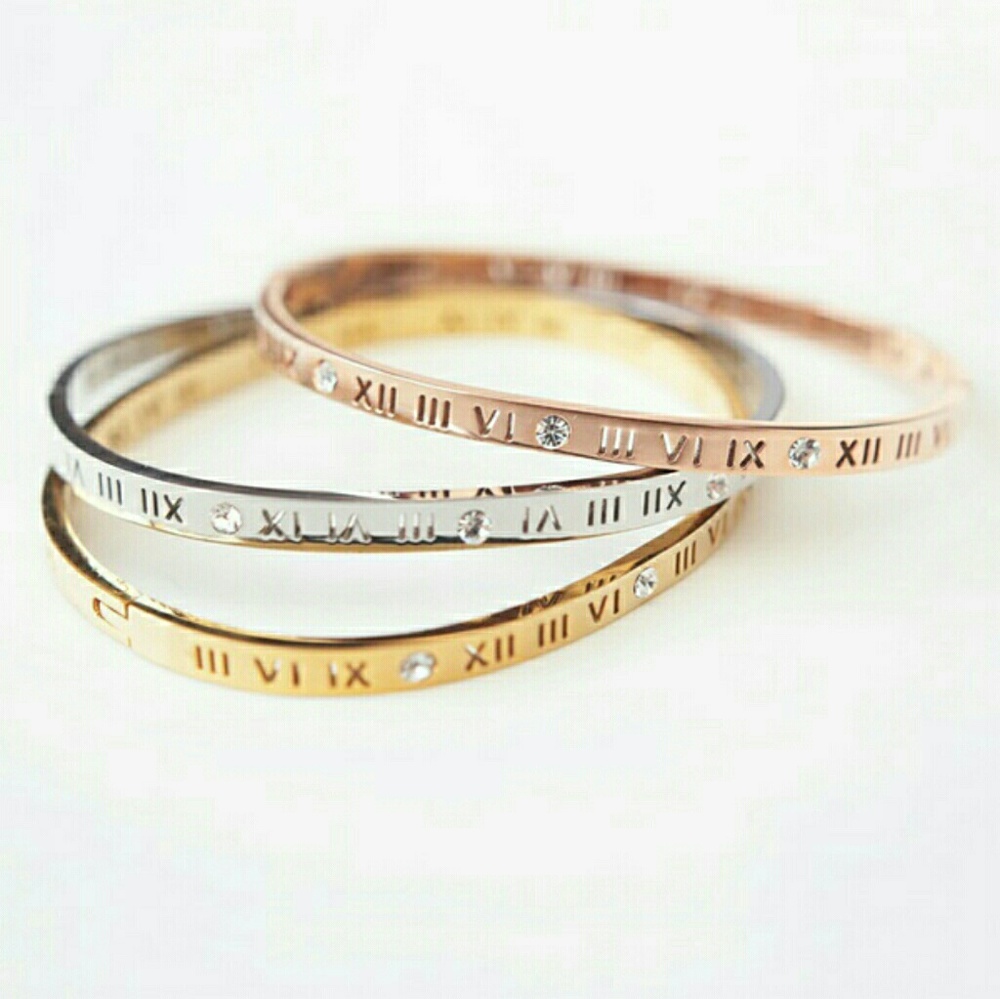 Goldtone, Rosegold, and silver titanium bracelets